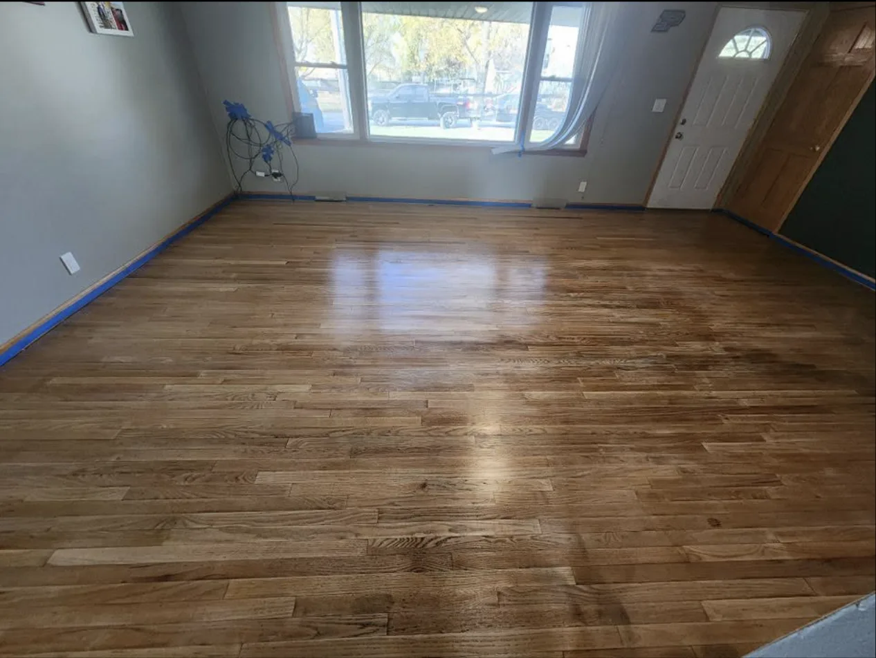 Hardwood floor refinished by Helpful Home Solutions in Monticello, Indiana