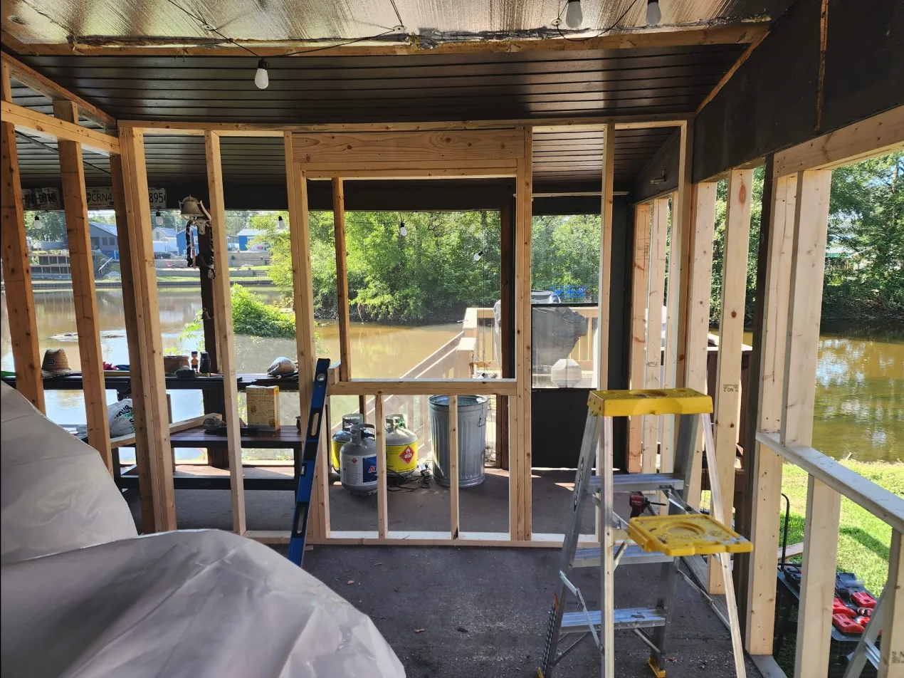 Lakeside porch enclosure framing